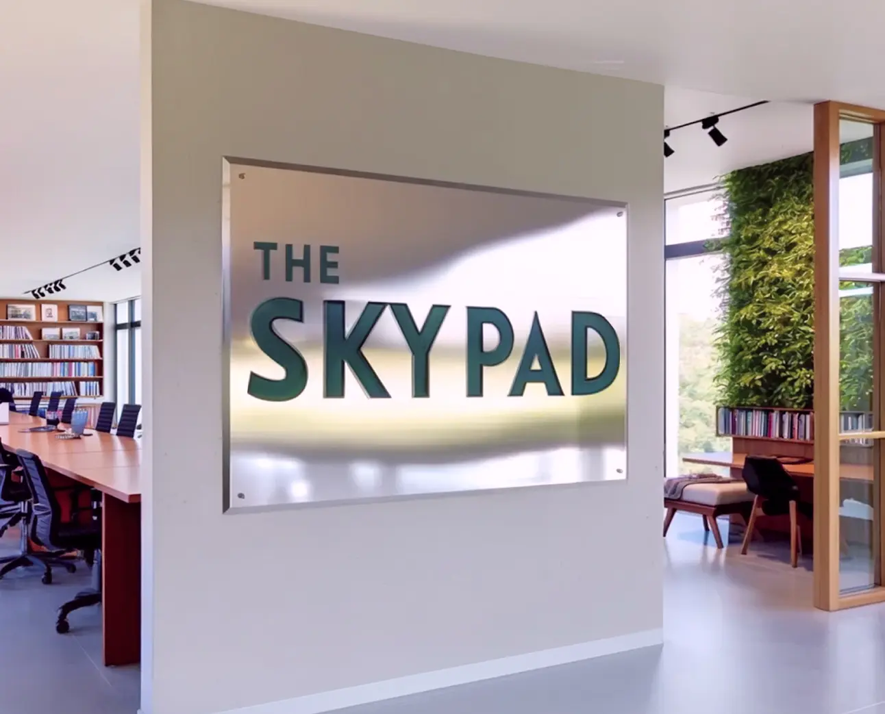 Skypad brass plaque sign mounted indoors