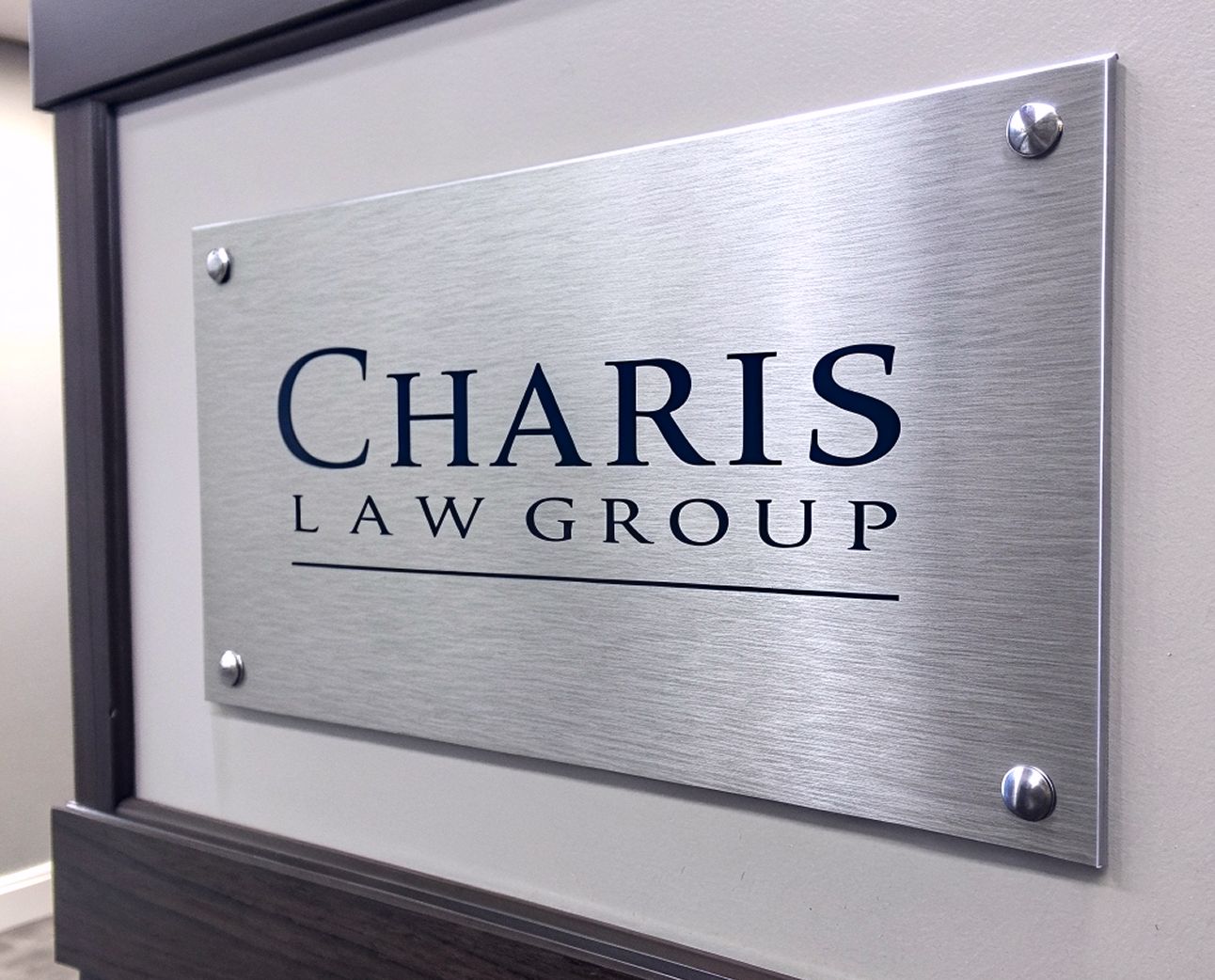 Charis Law Group brushed stainless plate sign
