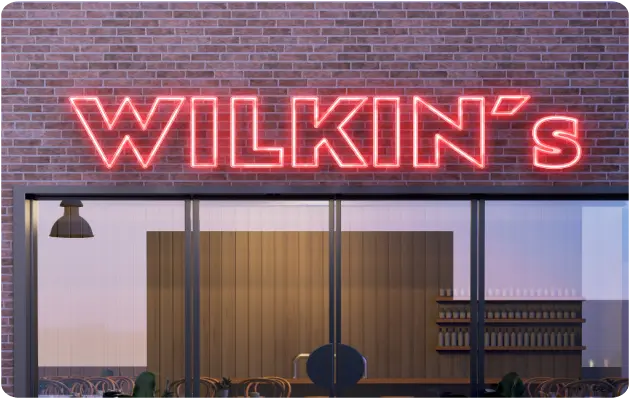 Wilkins custom neon shop sign designed in Sign Customiser