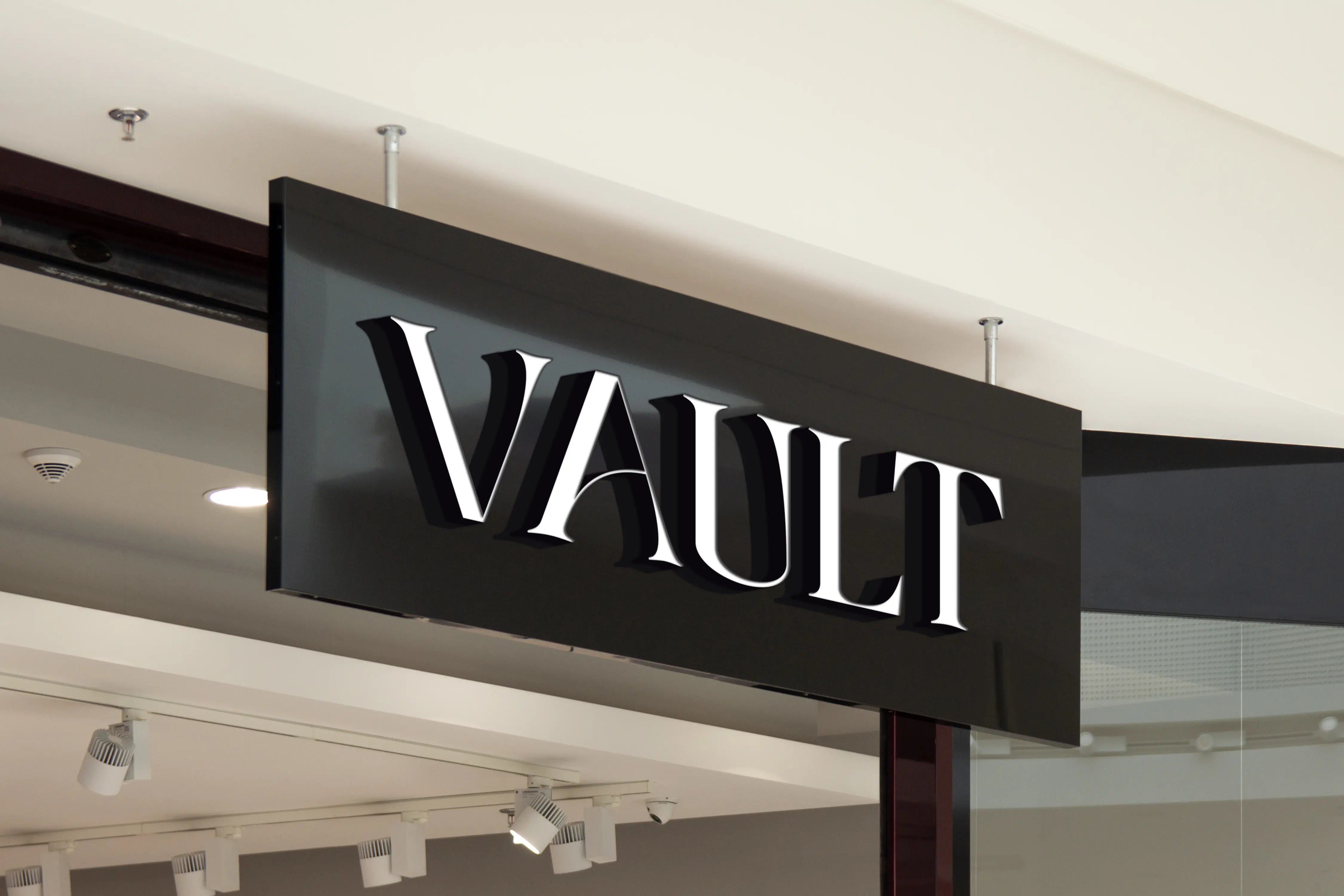 Vault channel letter sign on a brick storefront