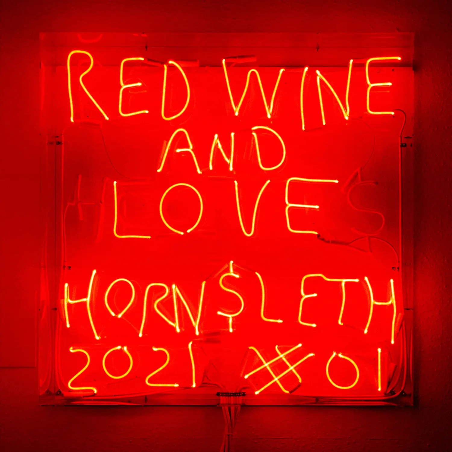 A cursive script neon sign design showing the handwritten style common in aesthetic neon signs