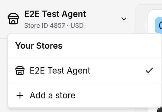 The store switcher open in the Sign Customiser admin sidebar, showing the Your Stores list with a tick on the current store and an Add a store item.