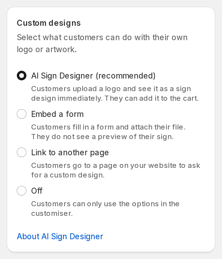 The Custom designs card on the Custom Designs page. AI Sign Designer (recommended) is selected.