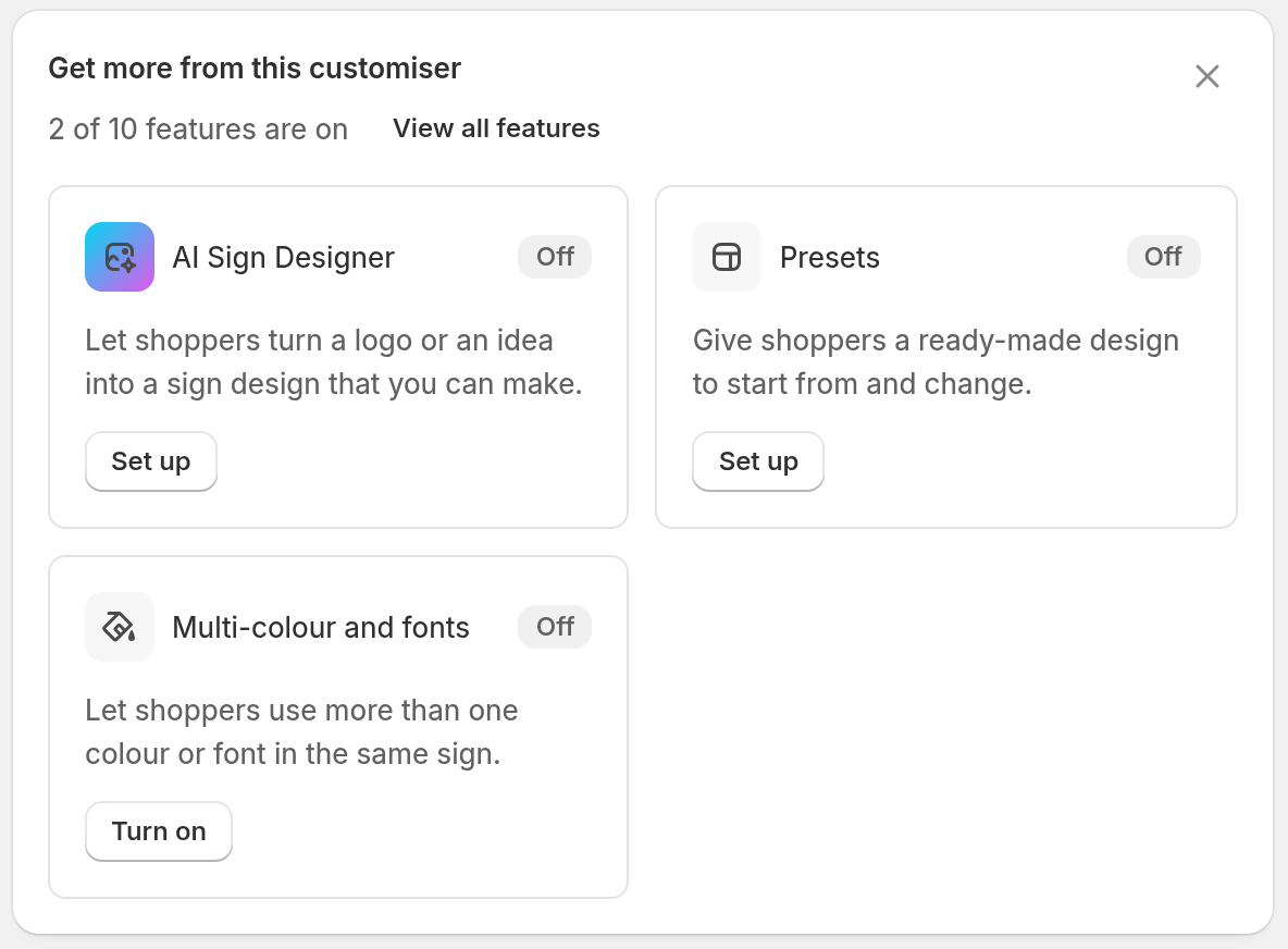 The Get more from this customiser card. It shows 2 of 10 features are on, View all features, and tiles for AI Sign Designer, Presets and Multi-colour and fonts, each with an Off badge.